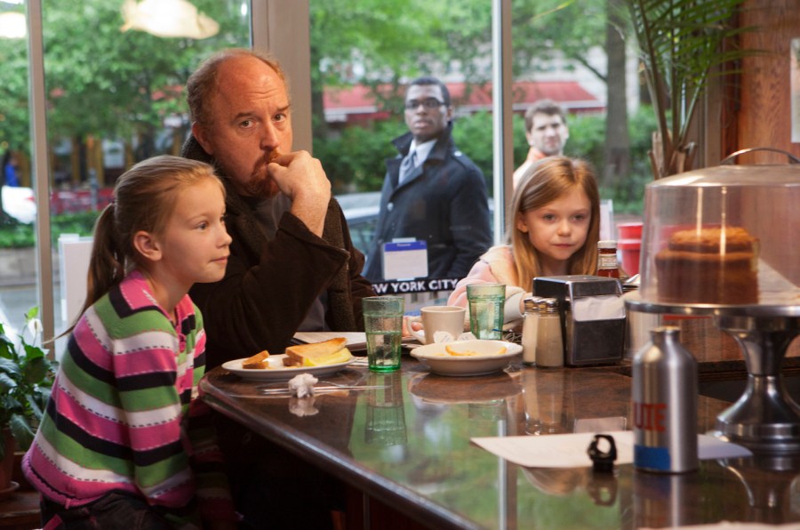 LOUIE: Episode 4: Daddy's Girlfriend, Pt. 1 (Airs July 19, 10:30 pm e/p). L-R: Hadley Delaney as Lilly, Louis C.K. as Louie, Ursula Parker as Jane. CR: K.C. Bailey/FX